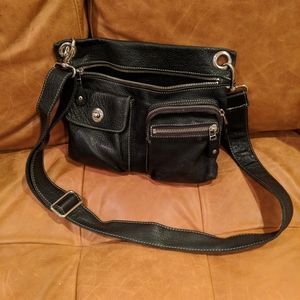 Roots cross body bag